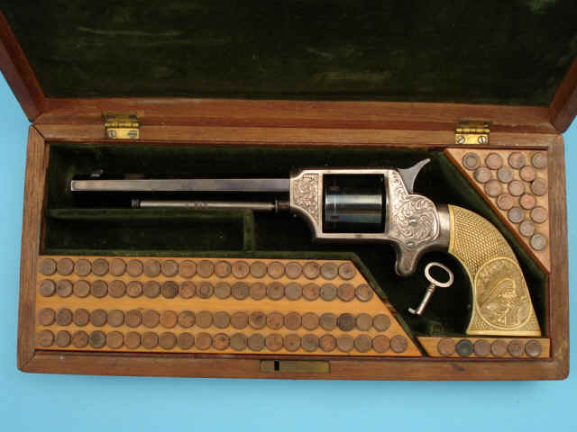 Fine and Rare Cased, Engraved, and Ivory Gripped William Uhlinger Pocket Single Action Revolver with Low Serial Number, Presentation from the Inventor