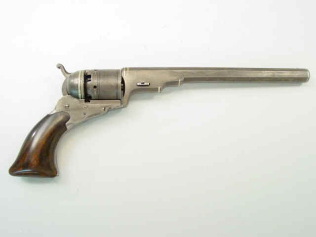 A Fine and Rare Nine-Inch Colt Texas Paterson No. 5 Holster Model Revolver, with Eight Silver Band Inlays