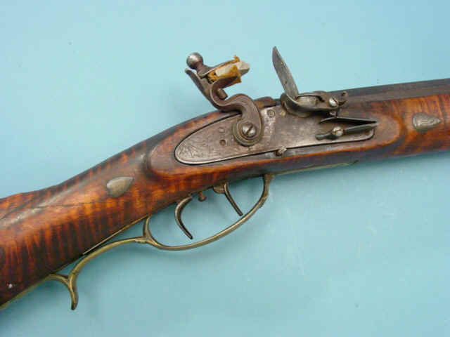 Fine Quality Carved and Silver-Mounted Deluxe Flintlock Kentucky Rifle Signed by William Holtzworth, Lancaster, Pennsylvania, c. 1820